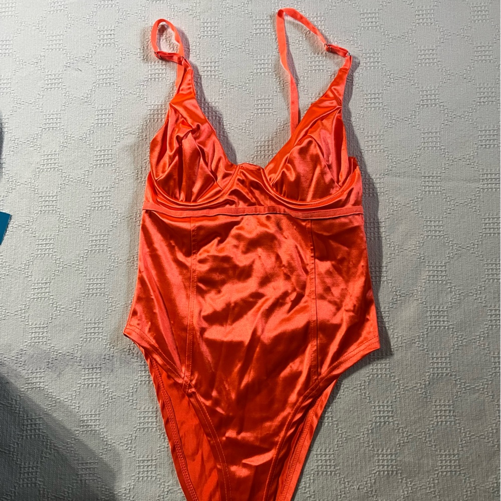 neon orange body suit